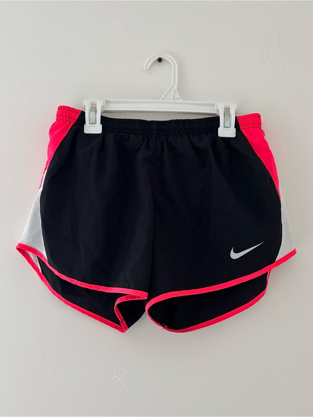 Nike Dri-Fit black shorts with pink/white side panels